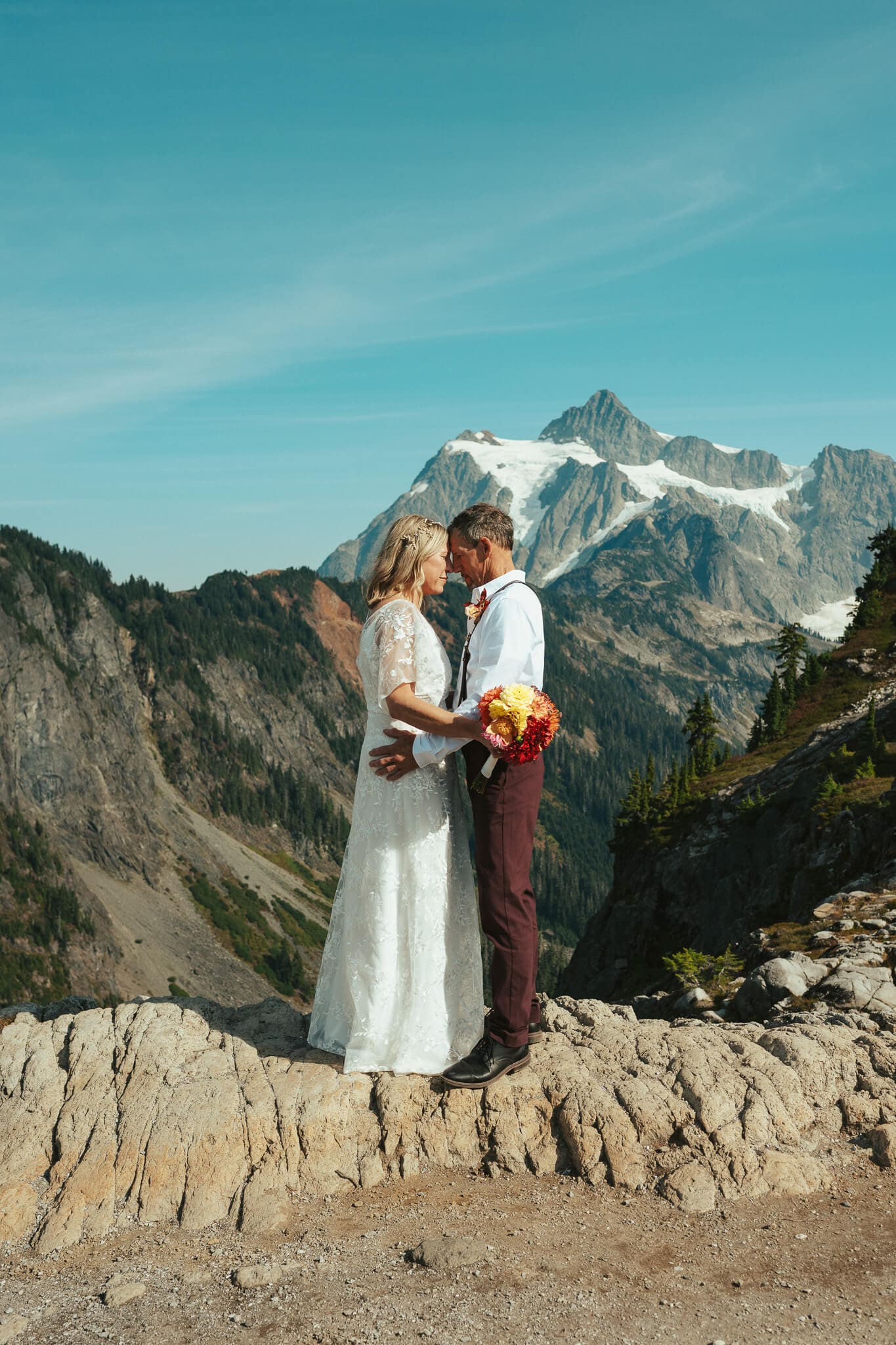 An intimate mountain elopement portrait at Artist Point in Mt Baker National Forest captured in a documentary style by a Snohomish wedding photographer in the Pacific Northwest.