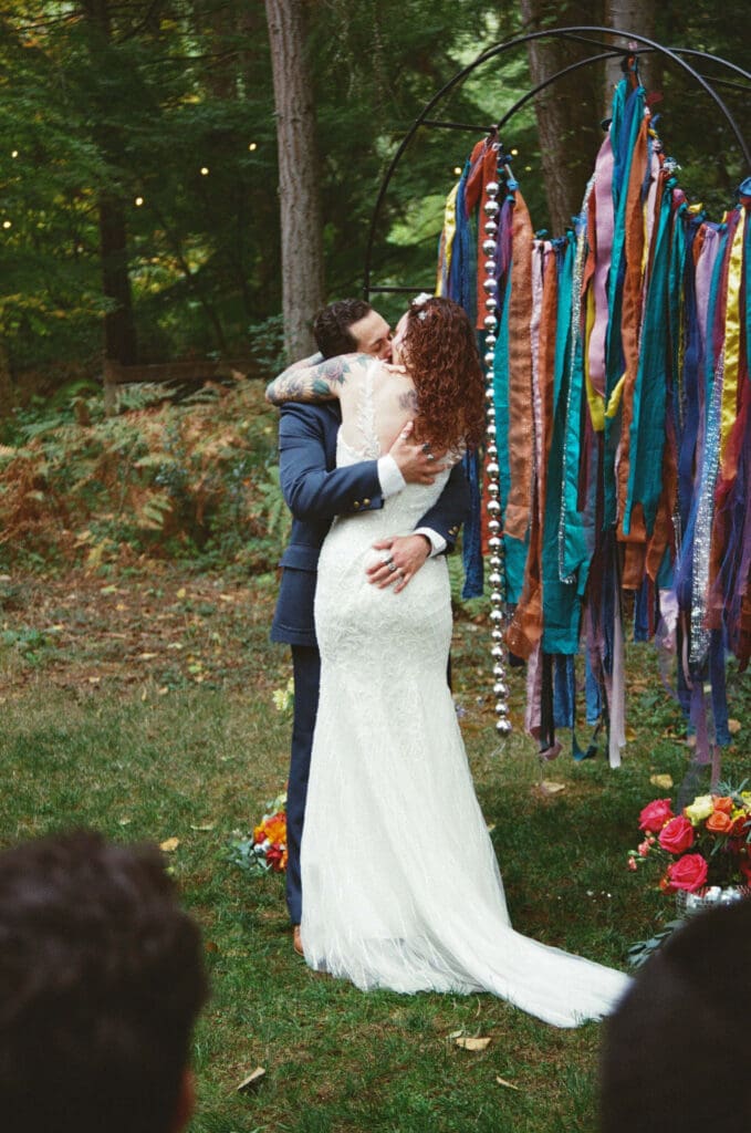 Color film wedding ceremony at Woodland Gardens Events on Vashon Island captured with intentional film wedding photography.