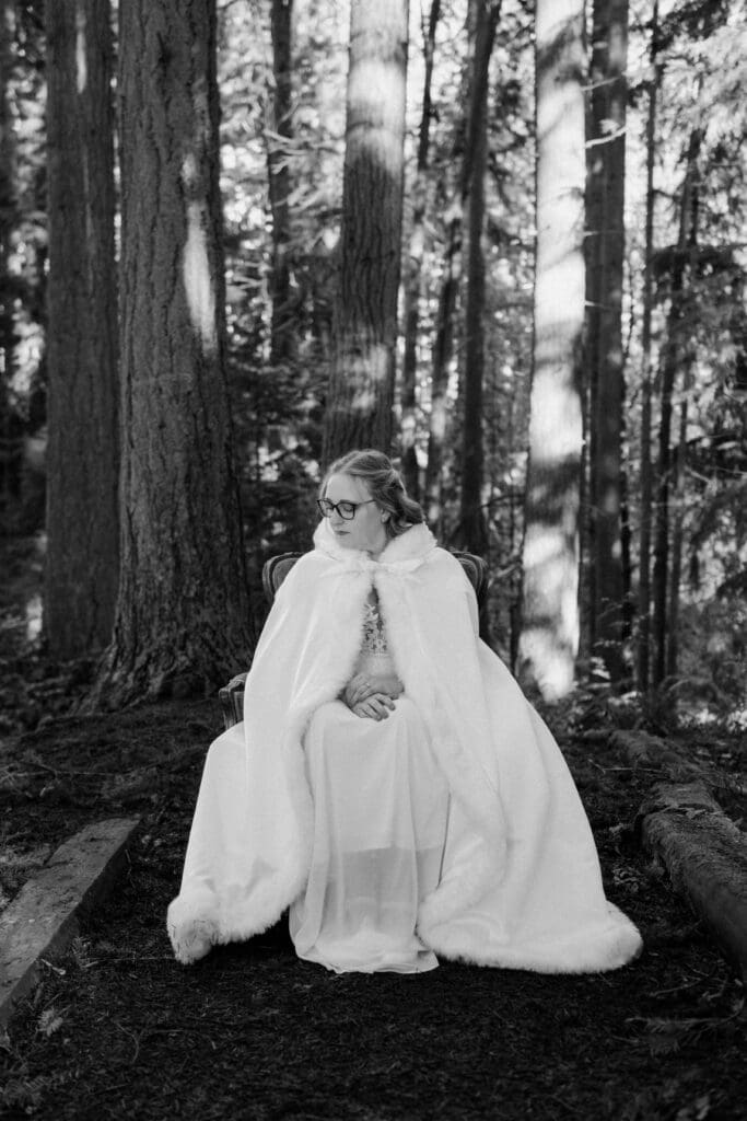 Black and white bridal portrait in a forest during a winter wedding near Floral Hall in Everett, WA.