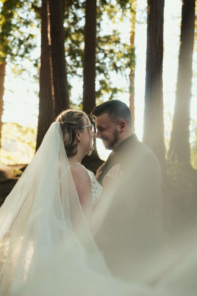 Golden hour couple portrait in the forest during a winter wedding near Floral Hall in Everett, WA.