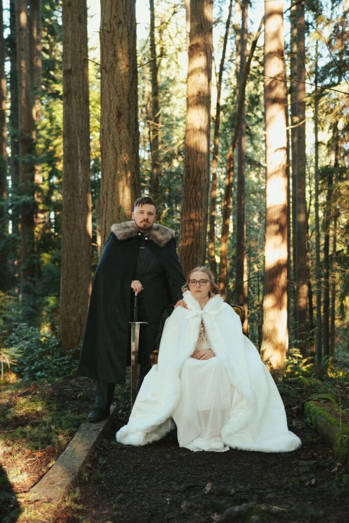 Couple portrait in a forest with winter light near Floral Hall in Everett, WA.
