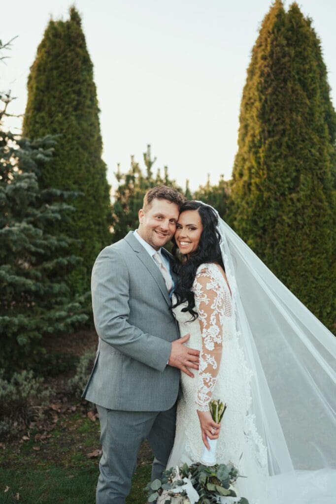 Bride and groom portraits in the evergreen garden at Dairyland wedding venue in Snohomish, Washington
